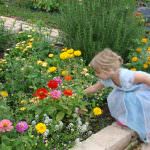 chesterfield-landscaping-ballwin-wildwood-landscape-design-st-louis-plant-installation-girl-picking-flowers